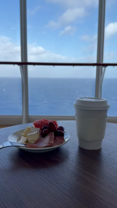 Vertical 4K Morning Breakfast By Panoramic Window On Cruise Ship Deck 15 Stock Footage 335387096