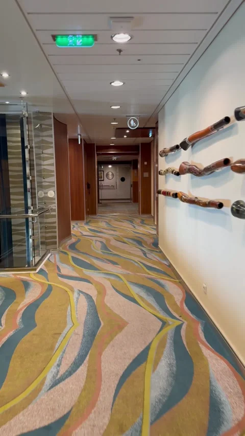 Vertical 4K POV Walking Down High Deck Luxury Suites Corridor To Cabin Door Stock Footage 335387095