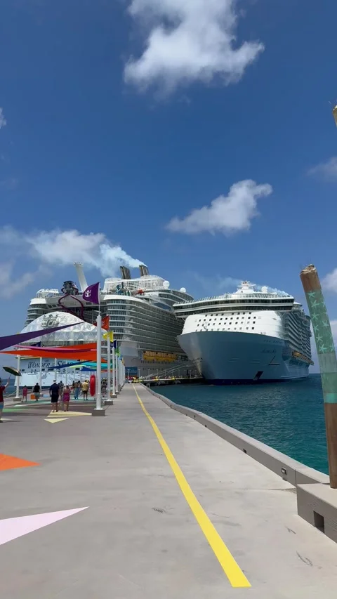Vertical 4K POV Walking On Pier Between Allure And Wonder Of The Seas Ships Vídeos de archivo 335548491