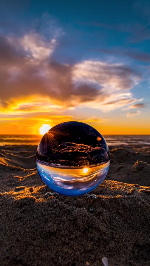 Vertical 4K Sunset Beach Timelapse With Crystal Ball Focus Blurred Background Stock Footage 322714523
