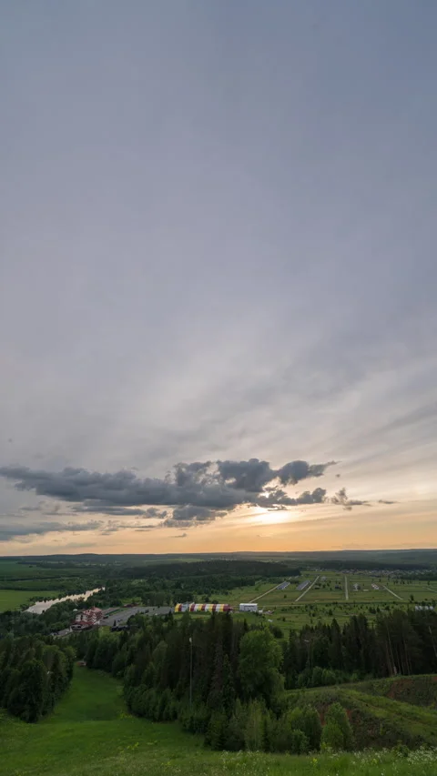 Vertical 4K Sunset Time-Lapse over Expansive Landscape Horizon Stock Footage 311078157