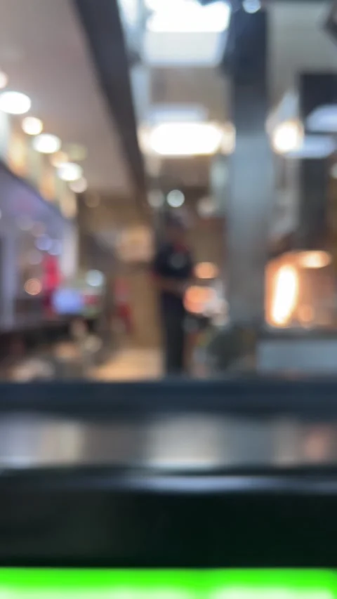 Vertical 4K video out of focus. Restaurant employee in cafe Stock Footage 281502564