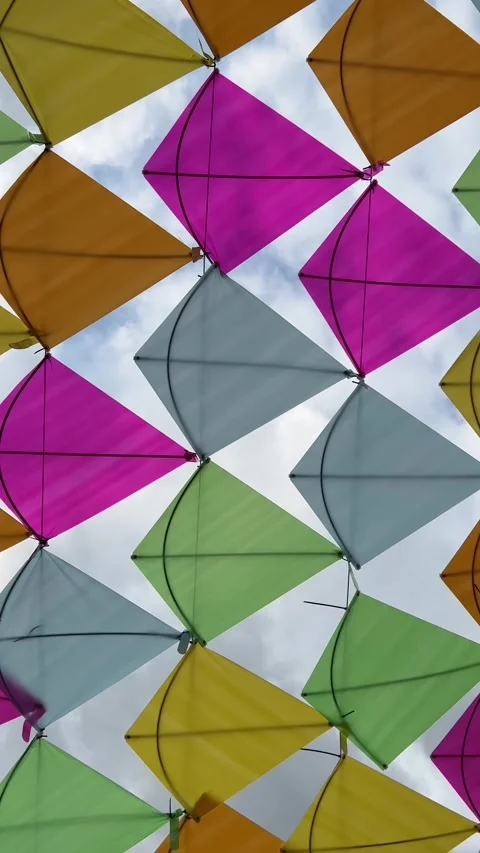 Vertical 4K video. Pattern of colorful kites. Tbilisi City Day Stock Footage 277826555
