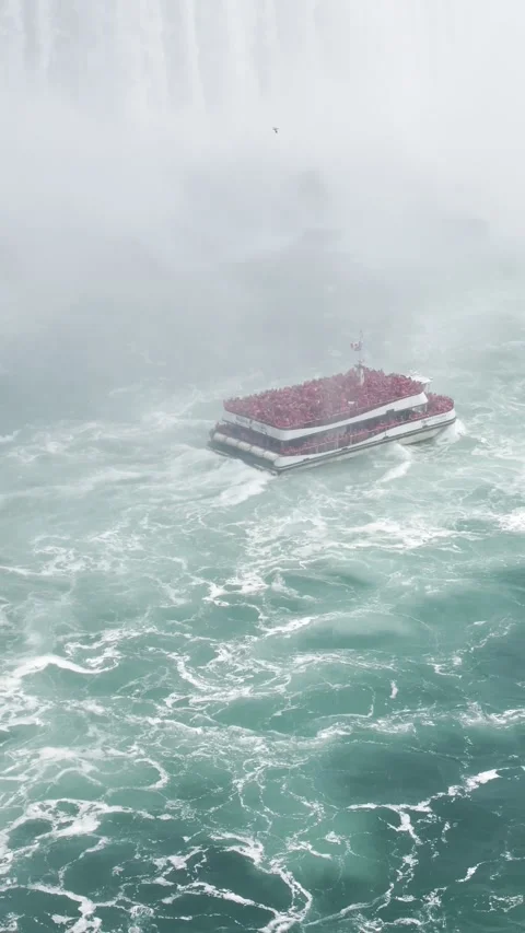 Vertical 4K video of a red ferry ride at Niagara Falls Stock Footage 342079784