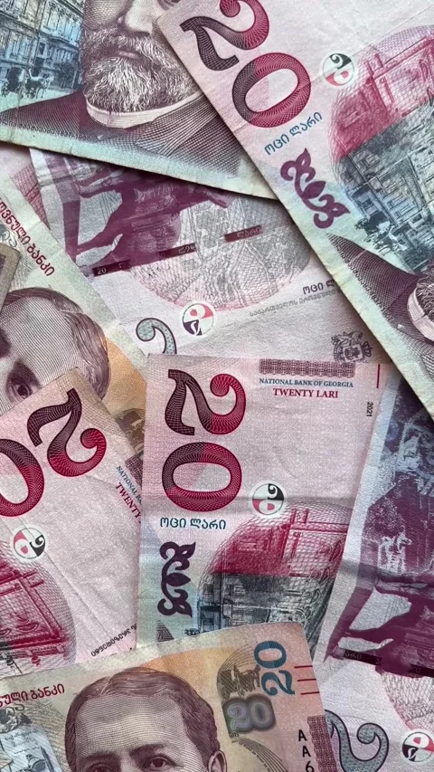 Vertical 4K video. Top view. 20 GEL. Twenty lari of Georgia. Camera moves Stock Footage 277236441