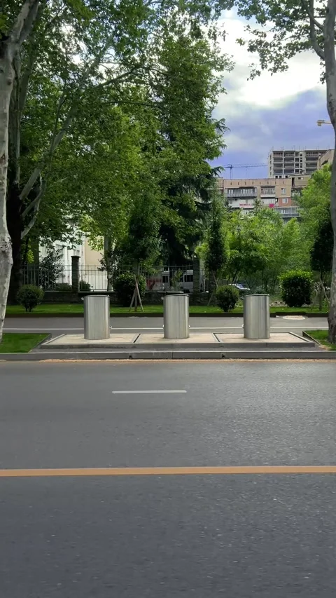 Vertical 4K video. View from window of public transport on city street Stock Footage 310397459