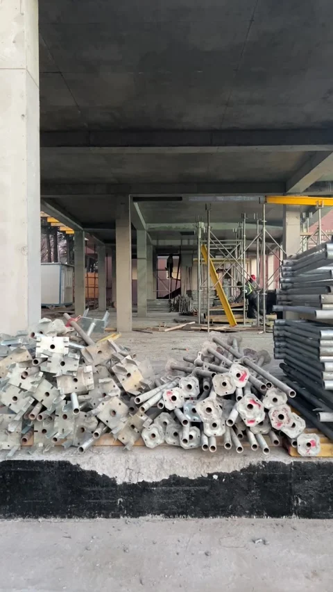 Vertical 4K video. Work at construction site of new house Video stock 297419774