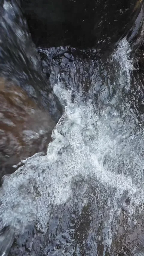 Vertical 4K Waterfall Stream Rushing Through Rocky River Channel Stock Footage 337158320