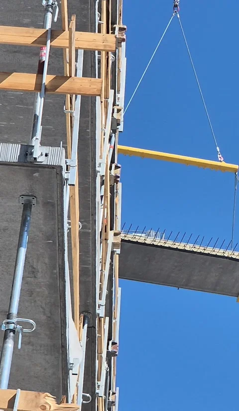 Vertical 9 16 Crane Lifting Concrete Floor Slab Stock Footage 338400641