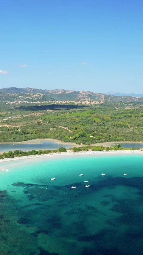 Vertical 9:16 aerial video of Cala Brandinchi beach near San Teodoro, Sardinia Stock Footage 346663147