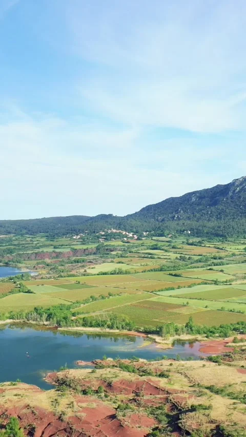 Vertical 9:16 aerial video showcasing Lac de Salagou in Herault, Occitanie Stock Footage 346663202