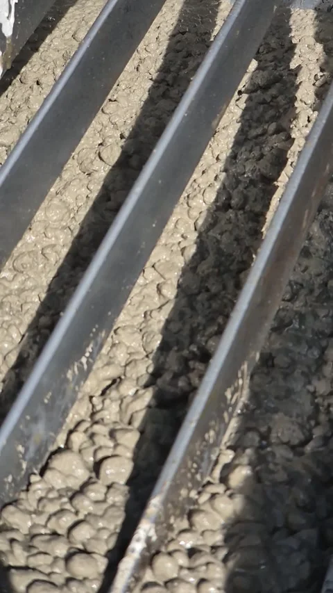 Vertical 9:16 Close-up of Concrete Pump Mixing Cement – Slow Motion Stock Footage 331161840