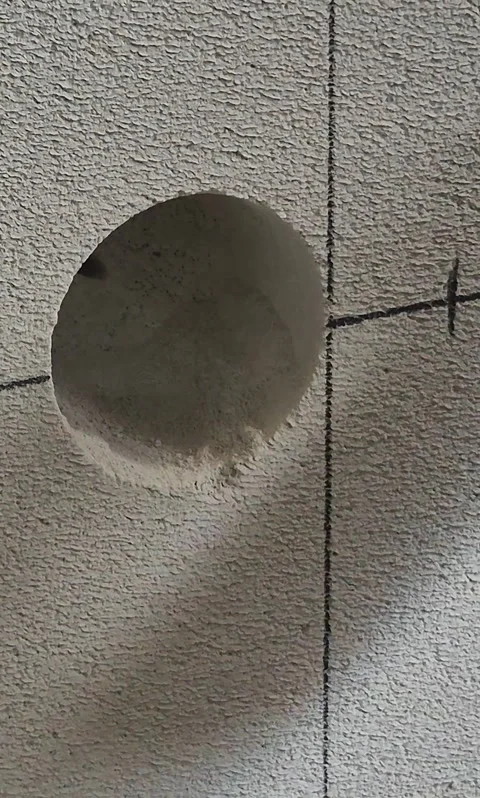 Vertical 9:16: Close-up Core Drilling Aerated Concrete Wall 動画素材 342621356