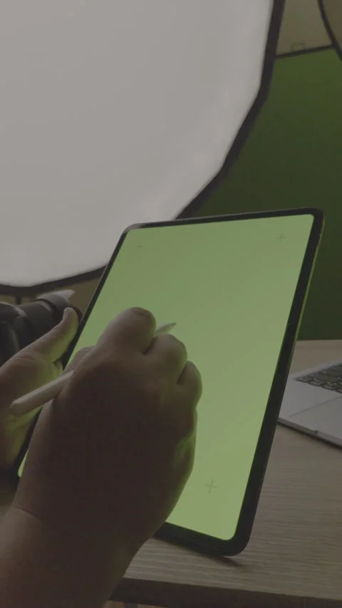 Vertical 9:16 - Close up hand using stylus pen on green screen tablet, LOG Stock Footage 331001147