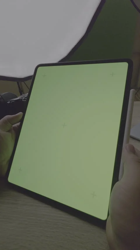 Vertical 9:16 - Close up hand using stylus pen on green screen tablet, LOG Stock Footage 331001240