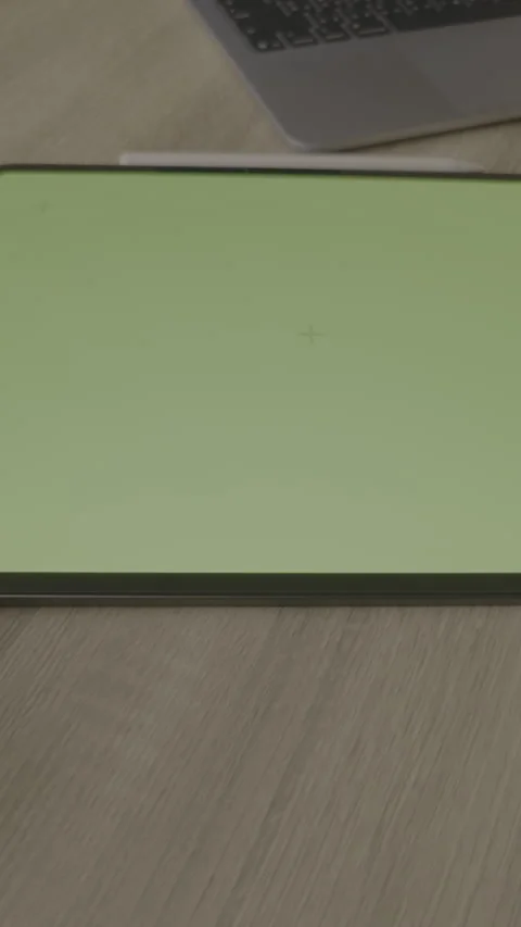 Vertical 9:16 - Close up hand using stylus pen on green screen tablet, LOG Stock Footage 331001242