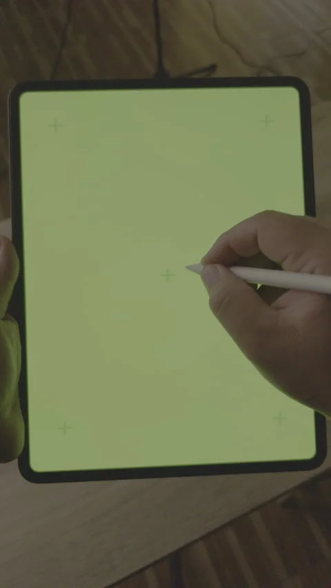 Vertical 9:16 - Close up hand using stylus pen on green screen tablet, LOG Stock Footage 331001254