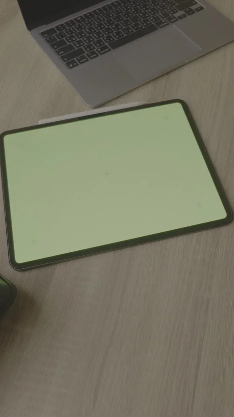 Vertical 9:16 - Close up hand using stylus pen on green screen tablet, LOG Stock Footage 331001256