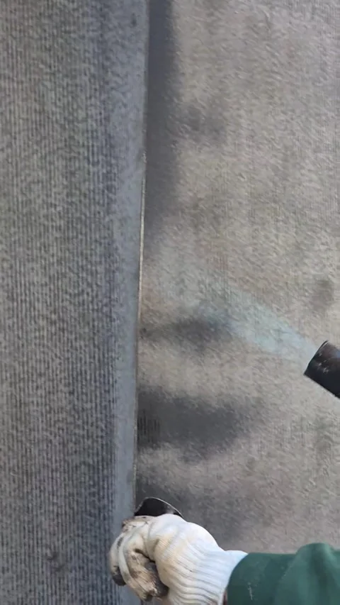 Vertical 9:16 Diagonal Shot of Torching Bituminous Membrane – Slow Motio Vídeos de archivo 331161901