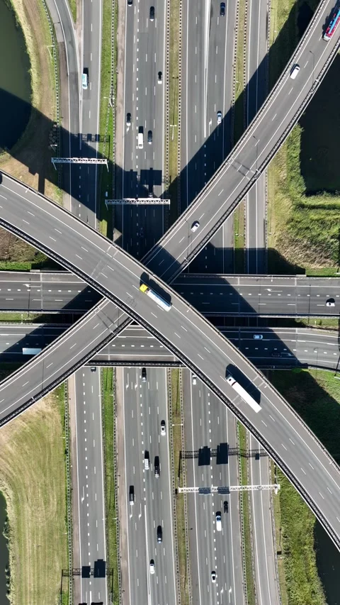 Vertical 9:16 drone shot of a complex road junction. Stock Footage 336982825