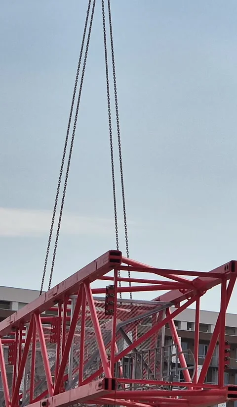 Vertical 9:16 Mobile Crane Lifting Tower Crane Section Stock Footage 331537000