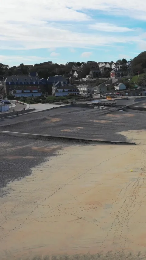 Vertical 9:16 video showing the beach at Veules-les-Roses in Normandy, France Stock Footage 346636791