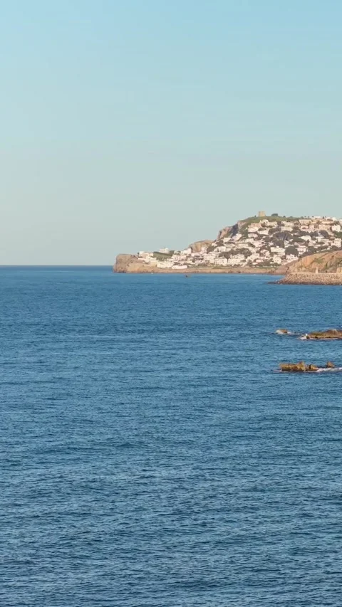 Vertical 9:16 video showing a clear view of the Mediterranean Sea with gentle Stock Footage 346662812