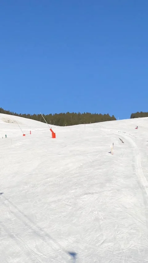 Vertical 9:16 video showing snow-covered ski slopes in Megeve, Haute-Savoie Stock Footage 346662572