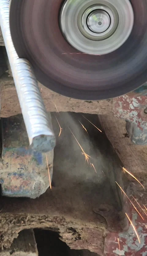 Vertical 9x16 Close Up of Angle Grinder Cutting Metal with Bright Sparks Stock Footage 334456195