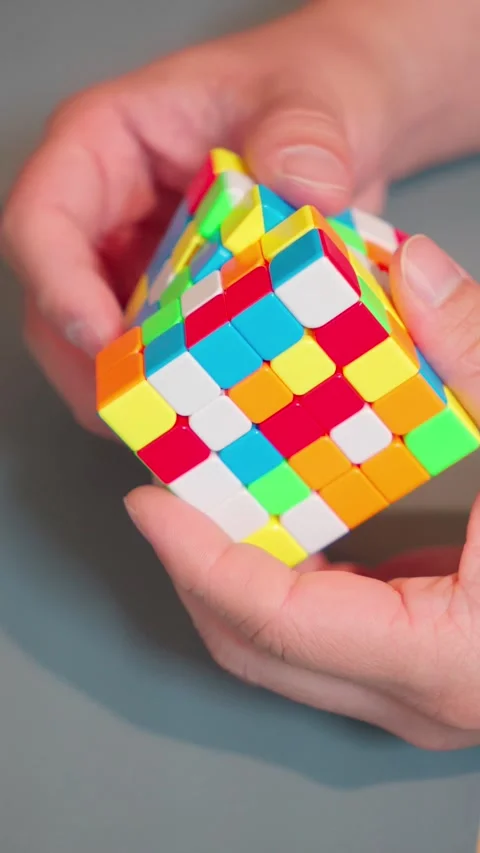 Vertical 9x16 Solving 5x5 Speedcube Puzzle Close Up Stock-Footage 340179114