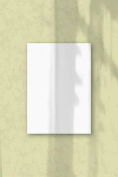 A Vertical A4 sheet of white textured paper on he soft yellow wall background Stock Illustration