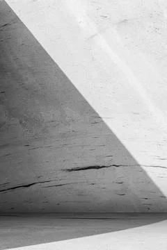 Vertical abstract background of a concrete wall with dramatic diagonal shad.. Stock Photos