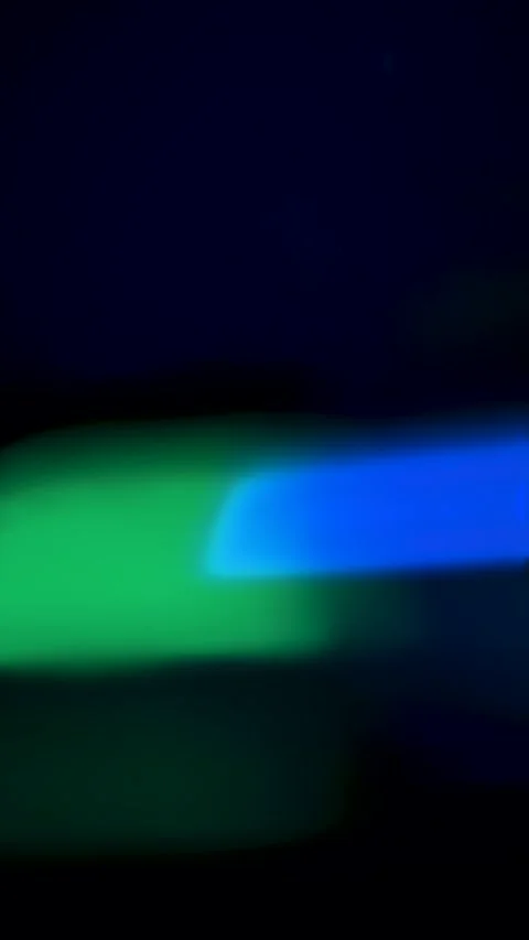Vertical Abstract Blue and Green Soft Bokeh Light Leaks Stock Footage 325534381