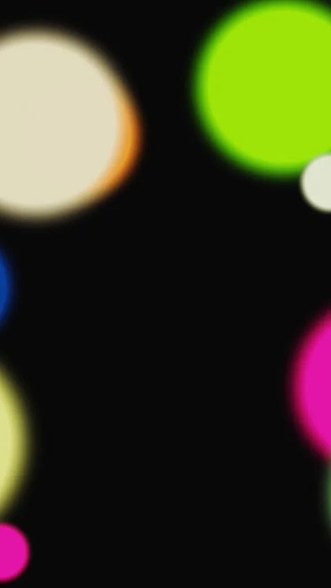 Vertical Abstract Bokeh Motion Background with Colorful Blurred Circles Stock Footage 337094598