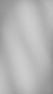 Vertical abstract grey grainy background texture with blurred gradient grun.. Stock Photos