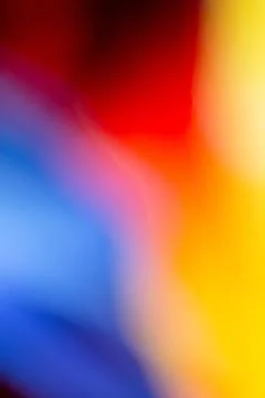 A vertical abstract illustration of soft smooth blurred red, blue and yellow  Stock Illustration