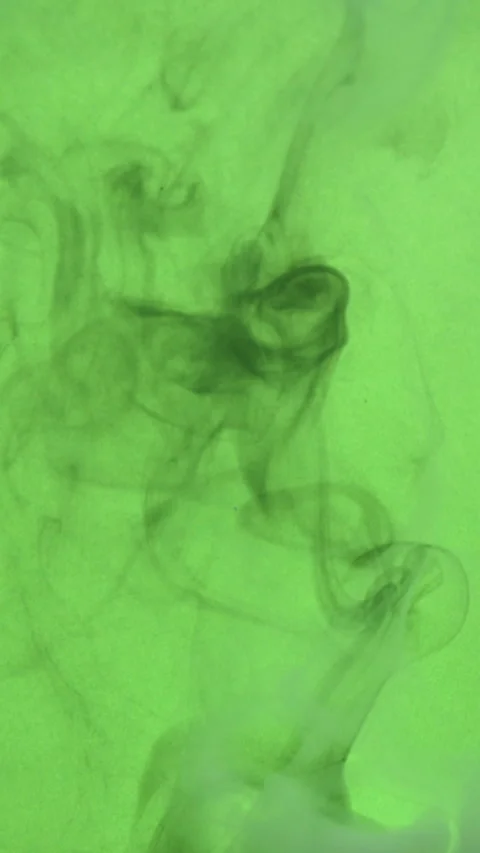 Vertical abstract smoke on green screen background, fog texture in slow motion Stock Footage 313515859