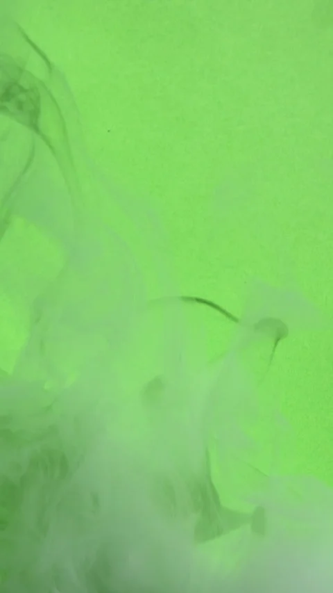 Vertical abstract smoke on green screen background, fog texture in slow motion Stock Footage 313915364