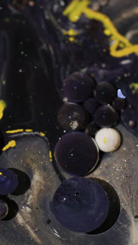 Vertical acrylic bubble paint oil glitter spill Stock Footage 335185217