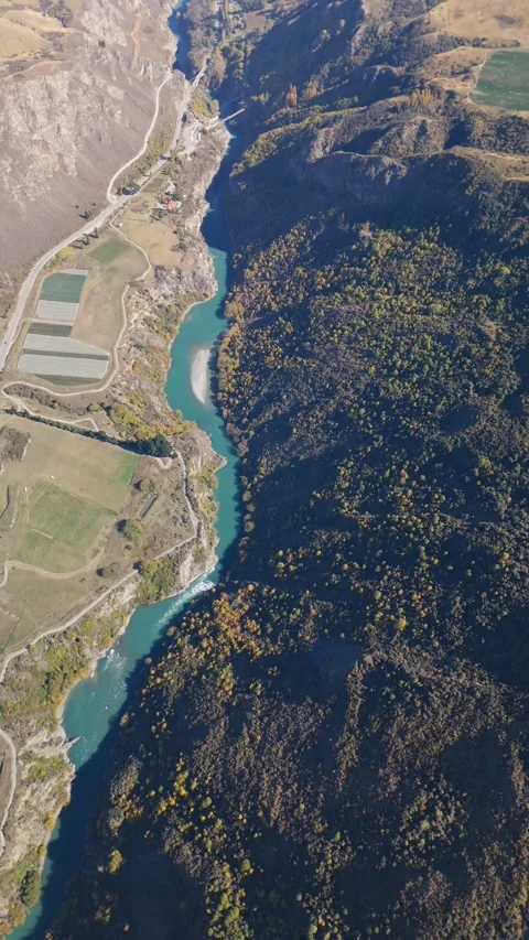 Vertical Aerial of Crown Range Valley and Snow Mountains Vídeo Stock 333971331