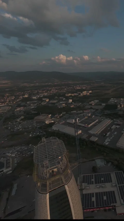 Vertical aerial drone orbit around modern skyscraper in Sofia, Bulgaria. Stock Footage 340814664