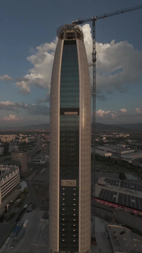 Vertical aerial drone pullback revealing modern skyscraper in Sofia, Bulgaria. Stock Footage 340814503