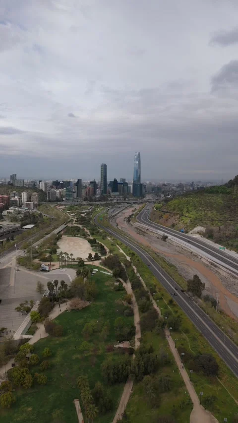 Vertical Aerial Drone Shot Approaching Costanera Tower and Financial District, S Stock Footage 320737454