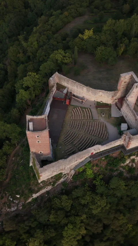 Vertical aerial drone top down orbit of medieval castle courtyard in Italy Stock Footage 342540298
