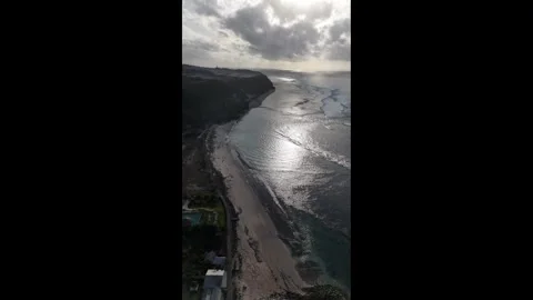 Vertical Aerial Drone View of a Tropical Beach at Sunset, 4K Footage Stock-Footage 342946572