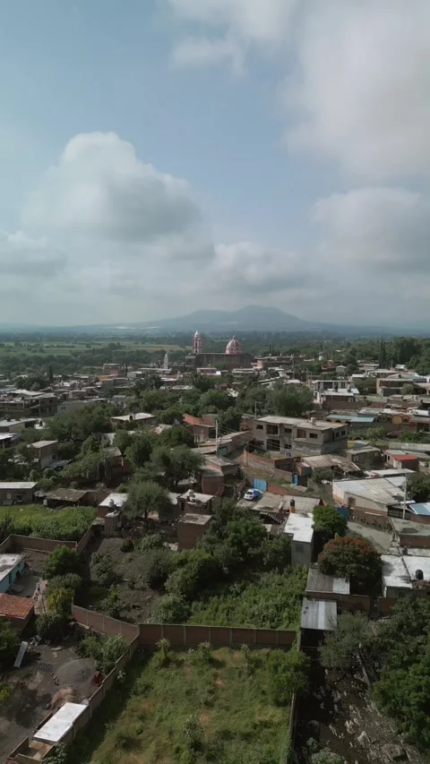 Vertical aerial flight over rural residential rooftops Stock Footage 342062103