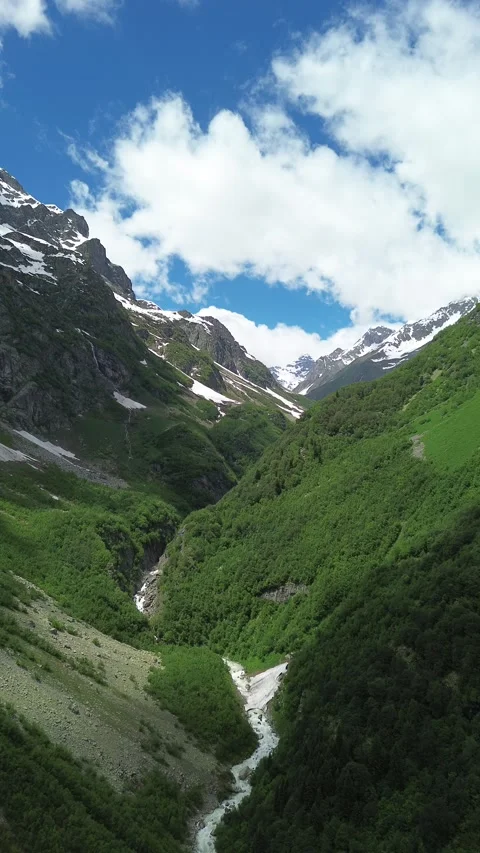 Vertical Aerial Flight Through Mountain Gorge With Snow Patches, Georgia, 4K Stock Footage 339301104