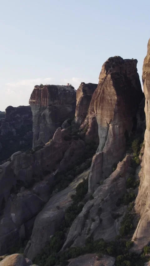 Vertical Aerial Flyover to Holy Trinity Monastery, Kalabaka Meteora Stock Footage 323077940