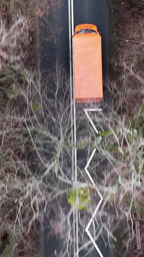 Vertical Aerial Forward Flight Top Down over Road with Two Way Traffic Stock Footage 323875857