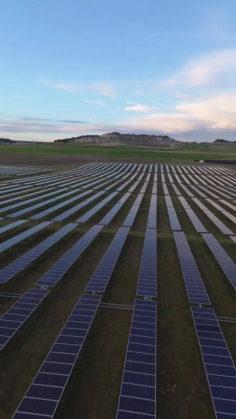 Vertical Aerial Forward Motion Over Solar Panel Rows for Renewable Energy Stock Footage 330051273